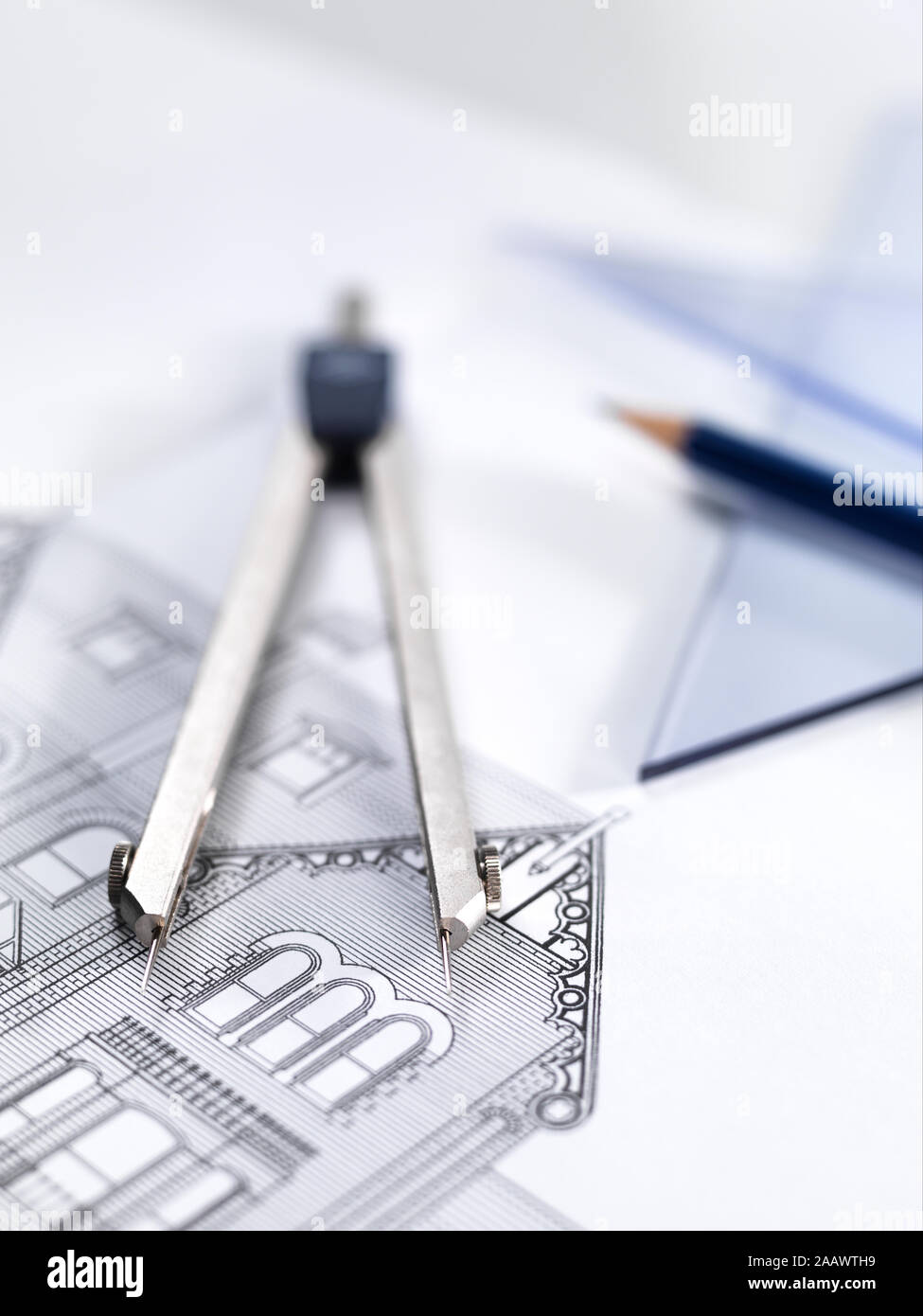 Close-up of drawing equipment on architectural blueprint in office Stock Photo