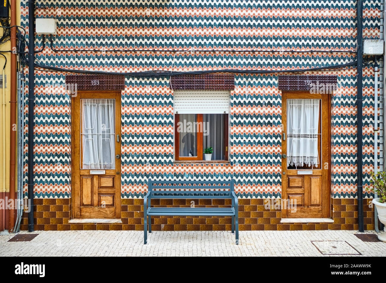 Portugal, Porto, Afurada, Unique ornate house facade seen from pavement Stock Photo