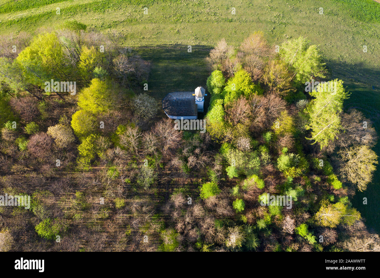 Aerial view of Chapel St. Georg amidst trees, Ascholding, Germany Stock Photo