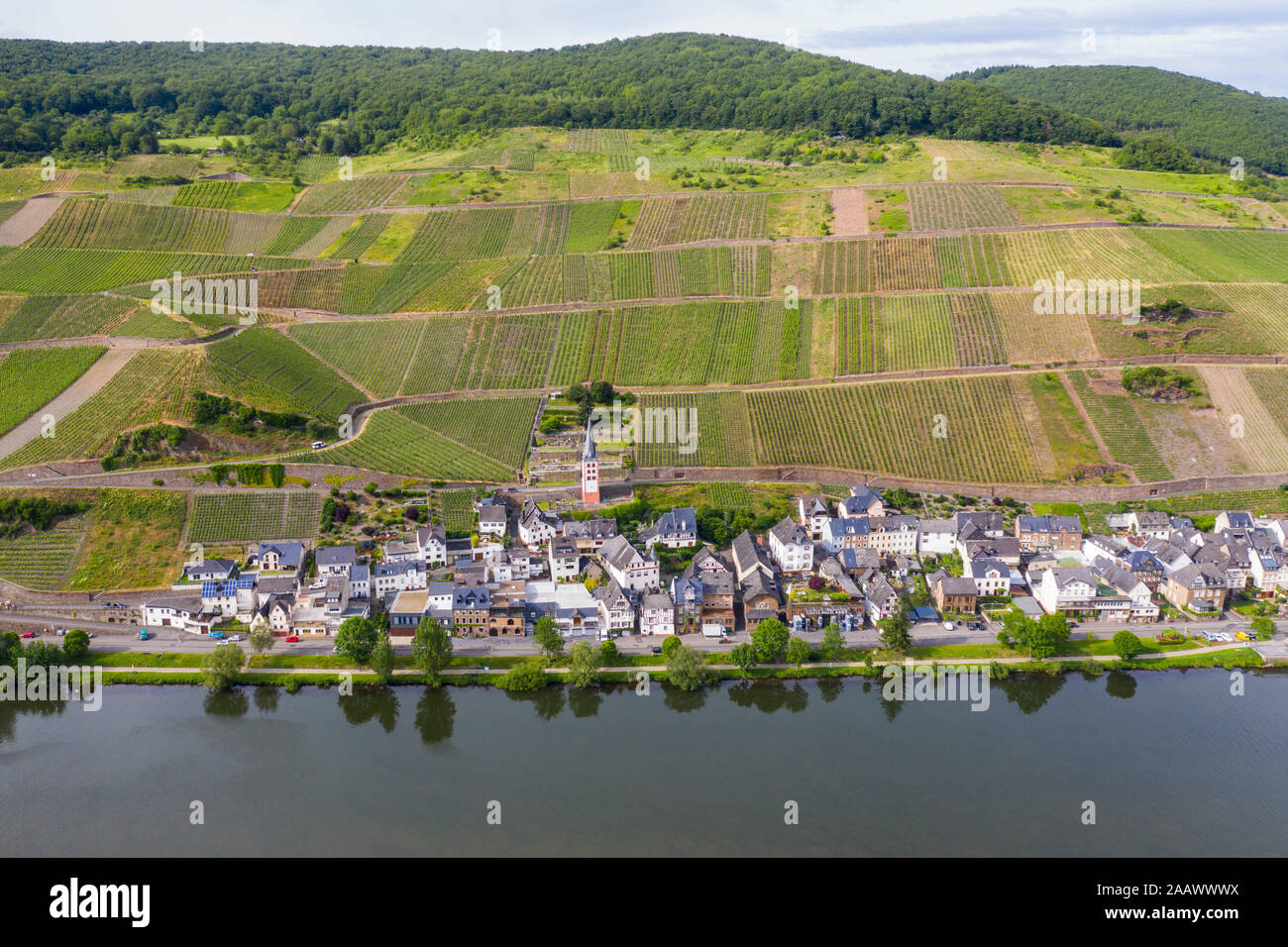 Drone shot of Zell town by Mosel River against sky, Germany Stock Photo