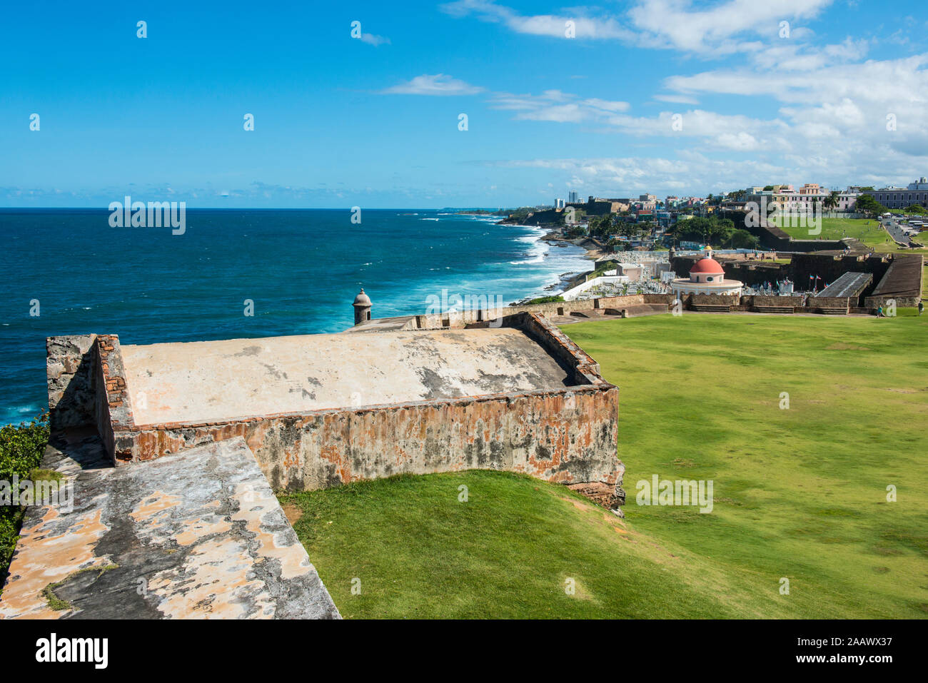 View of Santa María Magdalena de Pazzis Cemetery by sea against blue sky, Old San Juan, Puerto Rico, Caribbean Stock Photo