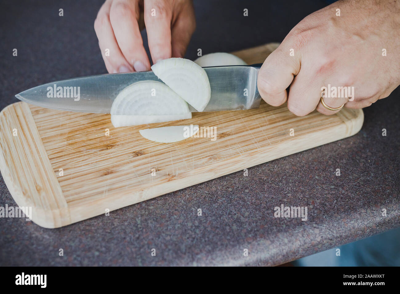 meal prepping concept, chef chopping onion on cutting board Stock Photo ...