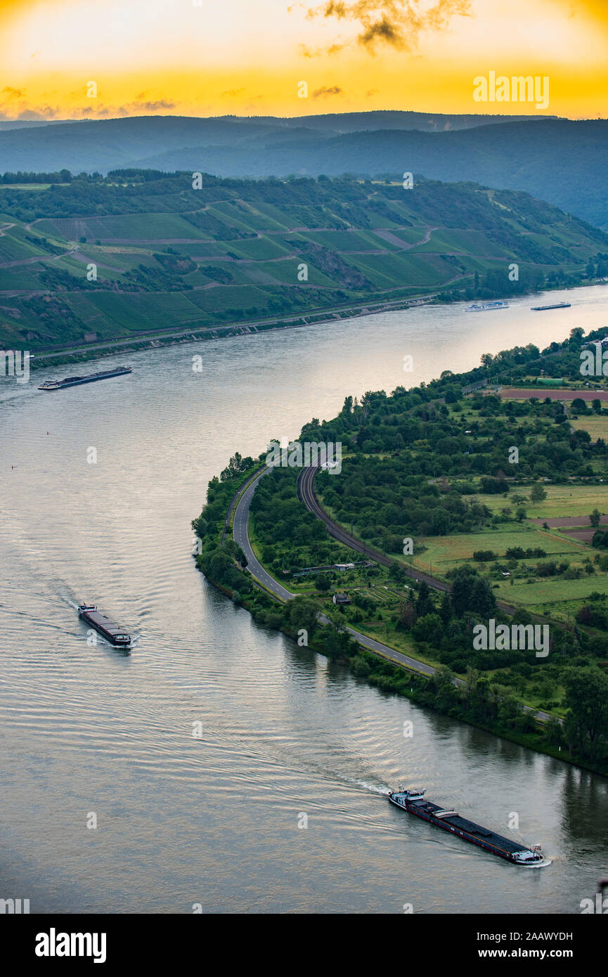 Aerial view of cruise ships on Rhine river against sky during sunset, Germany Stock Photo