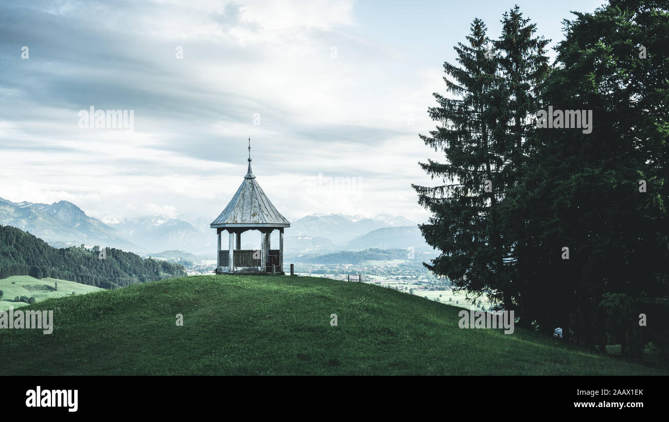 The Gebhardshöhe Pavillon with a view to the Allgäu alps in beautiful Bavaria, Germany Stock Photo