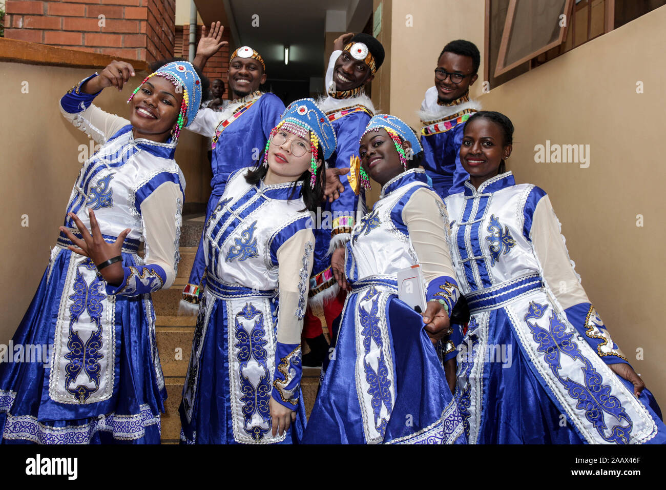 Kampala, Uganda. 23rd Nov, 2019. Students of the Confucius Institute at Makerere University pose for a group photo after performing at an event celebrating the 5th anniversary of the founding of the institute, in Kampala, Uganda, Nov. 23, 2019. Confucius Institute at Makerere University, Uganda's top university, on Saturday celebrated its fifth anniversary. The institution, as the nexus of Chinese language teaching, is playing a major role for cultural exchange between Uganda and China. Credit: Hajarah Nalwadda/Xinhua/Alamy Live News Stock Photo