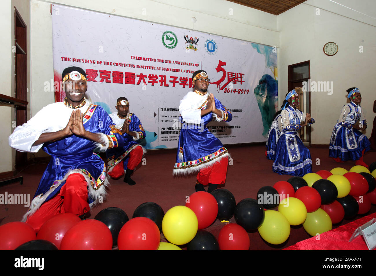 Kampala, Uganda. 23rd Nov, 2019. Students of the Confucius Institute at Makerere University perform at an event celebrating the 5th anniversary of the founding of the institute, in Kampala, Uganda, Nov. 23, 2019. Confucius Institute at Makerere University, Uganda's top university, on Saturday celebrated its fifth anniversary. The institution, as the nexus of Chinese language teaching, is playing a major role for cultural exchange between Uganda and China. Credit: Hajarah Nalwadda/Xinhua/Alamy Live News Stock Photo