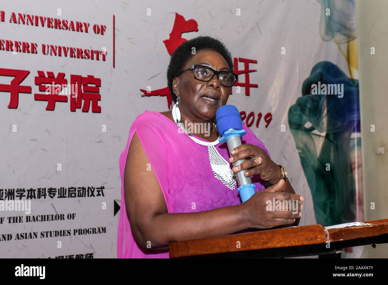 Kampala, Uganda. 23rd Nov, 2019. Mary Karoro, Uganda's minister in charge of general duties at the Office of Prime Minister, speaks during an event celebrating the 5th anniversary of the founding of the institute, in Kampala, Uganda, Nov. 23, 2019. Confucius Institute at Makerere University, Uganda's top university, on Saturday celebrated its fifth anniversary. The institution, as the nexus of Chinese language teaching, is playing a major role for cultural exchange between Uganda and China. Credit: Hajarah Nalwadda/Xinhua/Alamy Live News Stock Photo