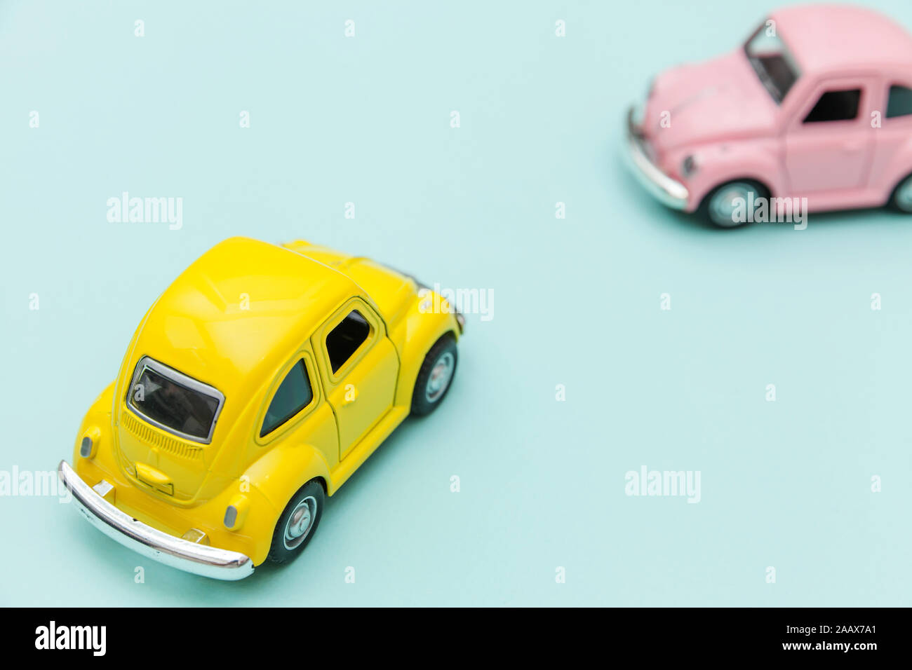 Simply Design With Two Yellow Pink Vintage Retro Toy Car Isolated On Blue Pastel Colorful Background Automobile And Transportation Symbol City Traffic Delivery Concept Copy Space For Text Stock Photo Alamy