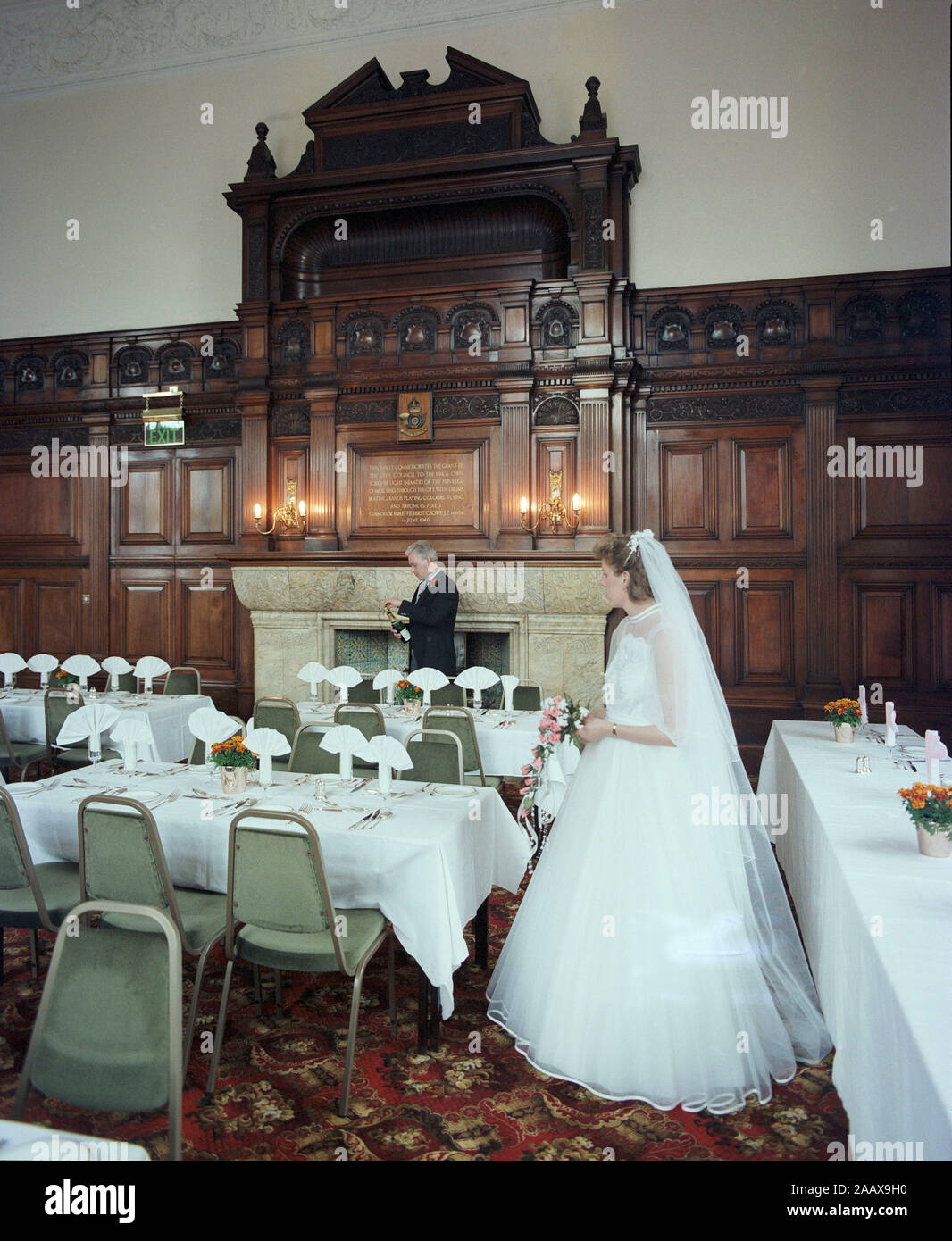 Couple in wedding finery in 1988, Wakefield Town Hall, North England, UK Stock Photo