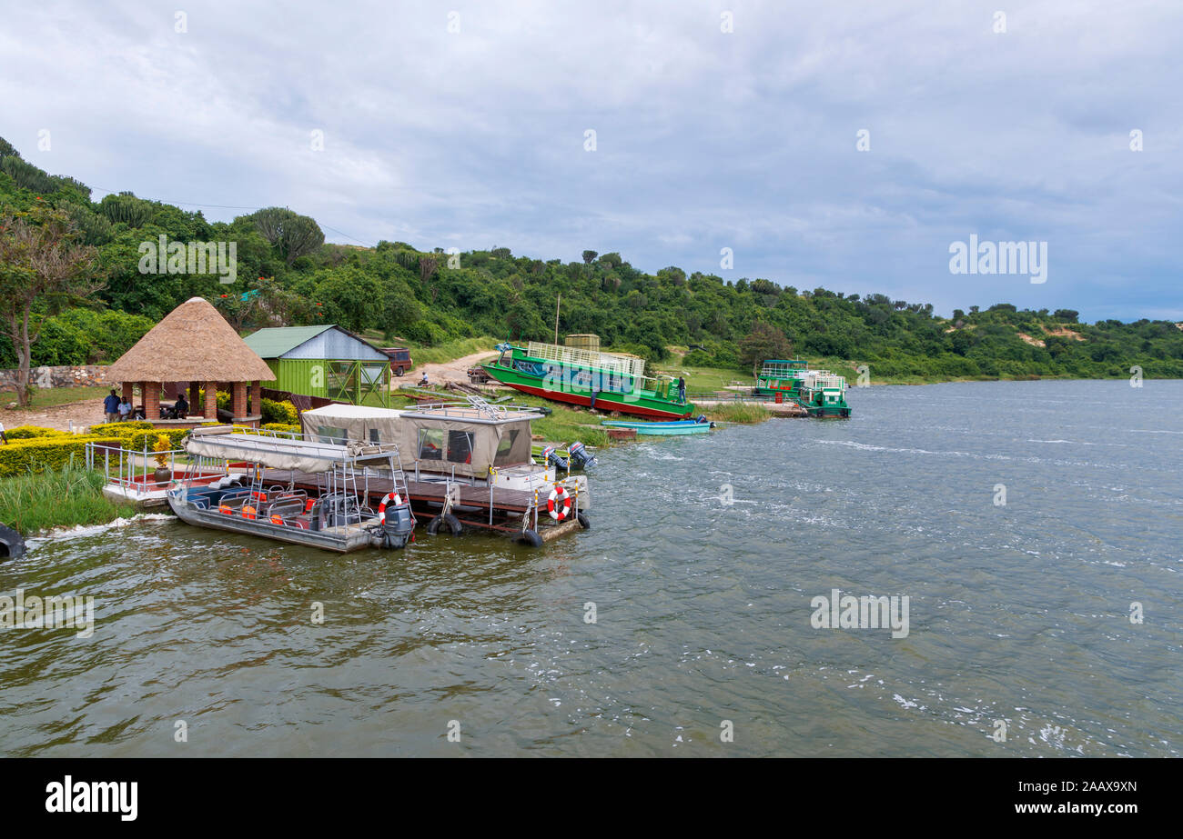 River safari wildlife tours boat station below Myewa Safari Lodge on Kazinga Channel by Lake Edward in Queen Elizabeth National Park, western Uganda Stock Photo