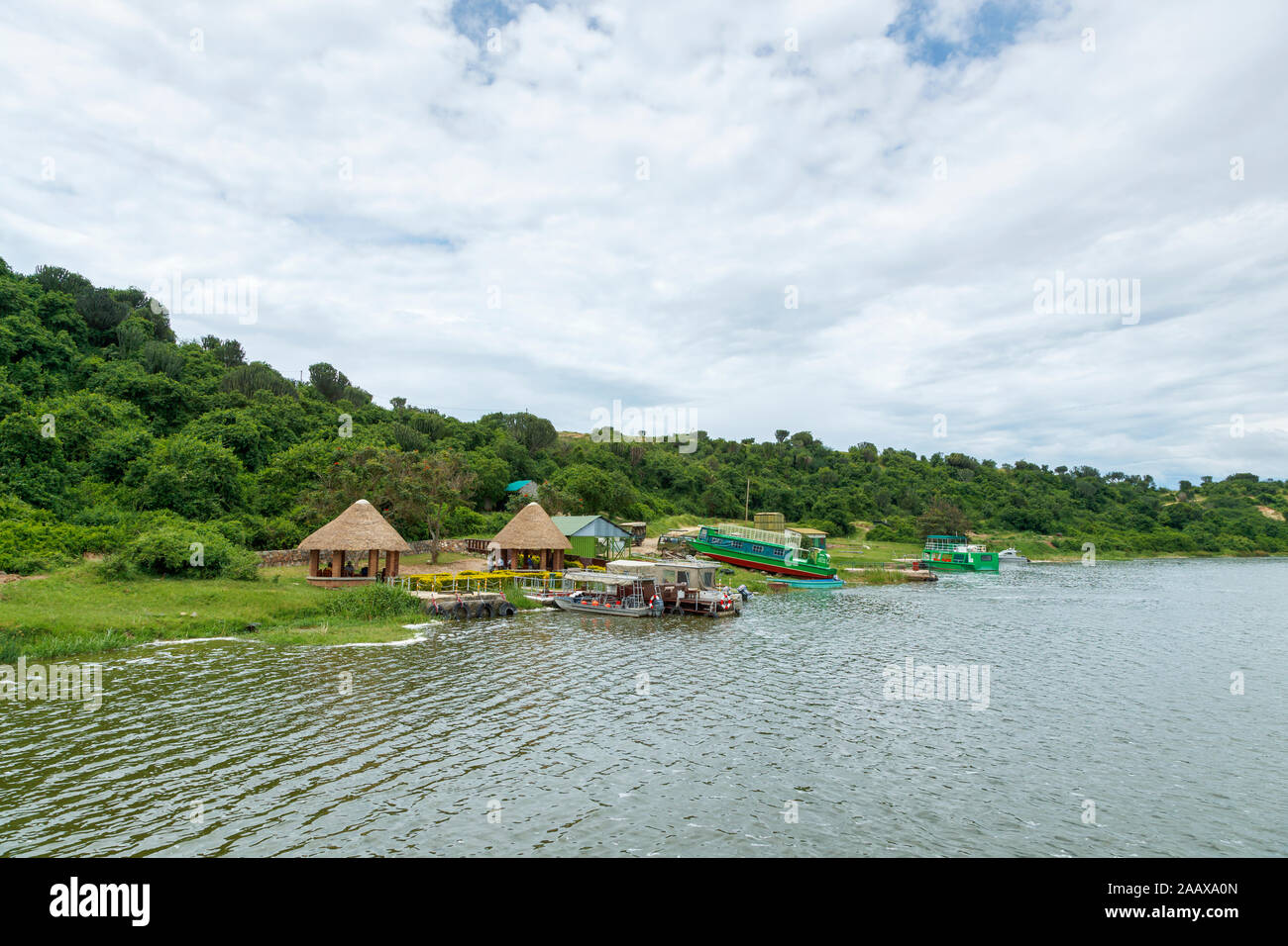 River safari wildlife tours boat station below Myewa Safari Lodge on Kazinga Channel by Lake Edward in Queen Elizabeth National Park, western Uganda Stock Photo