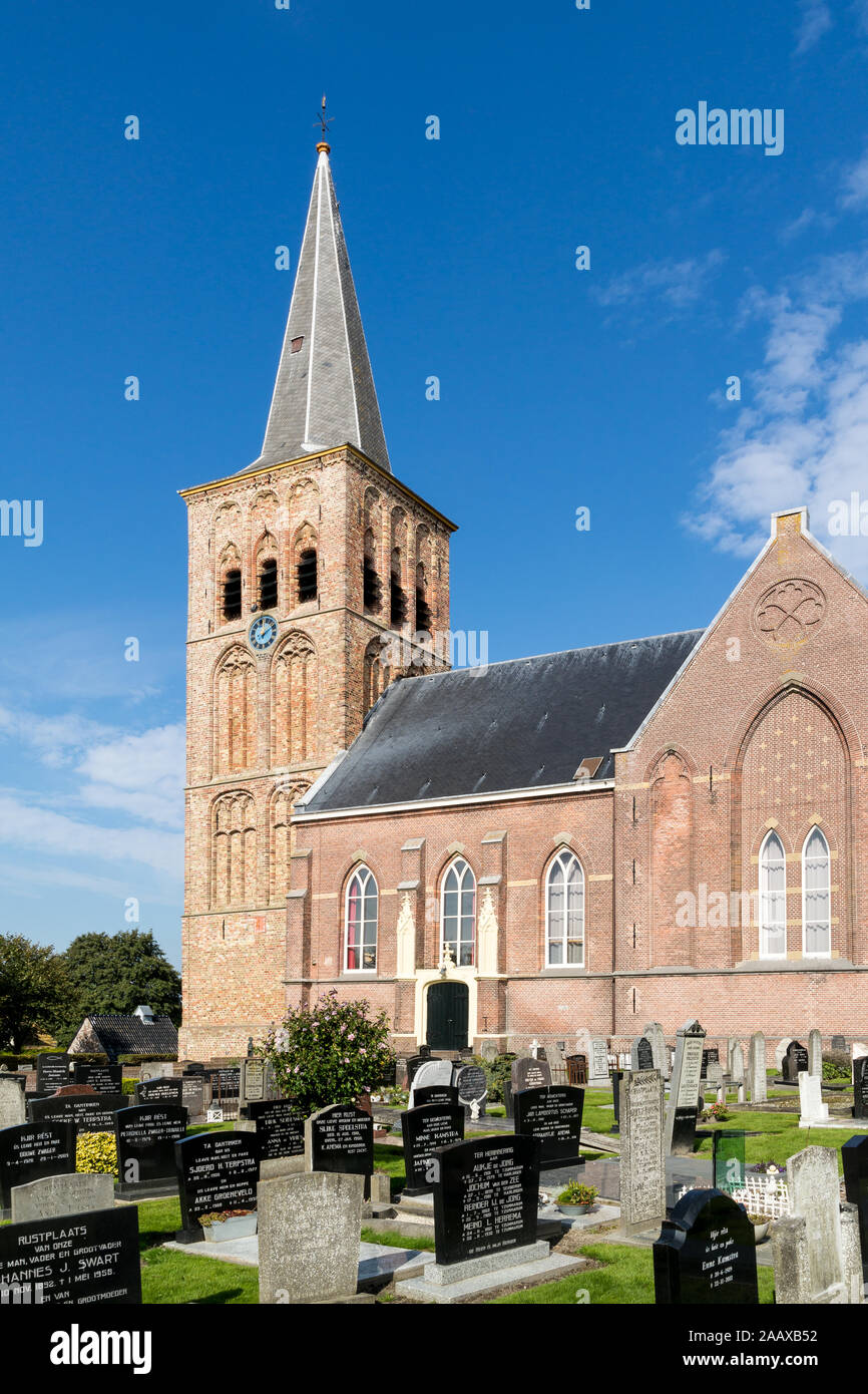 Saint Martin's Church and churchyard in the Frisian town of Tzummarum, Friesland, Netherlands Stock Photo