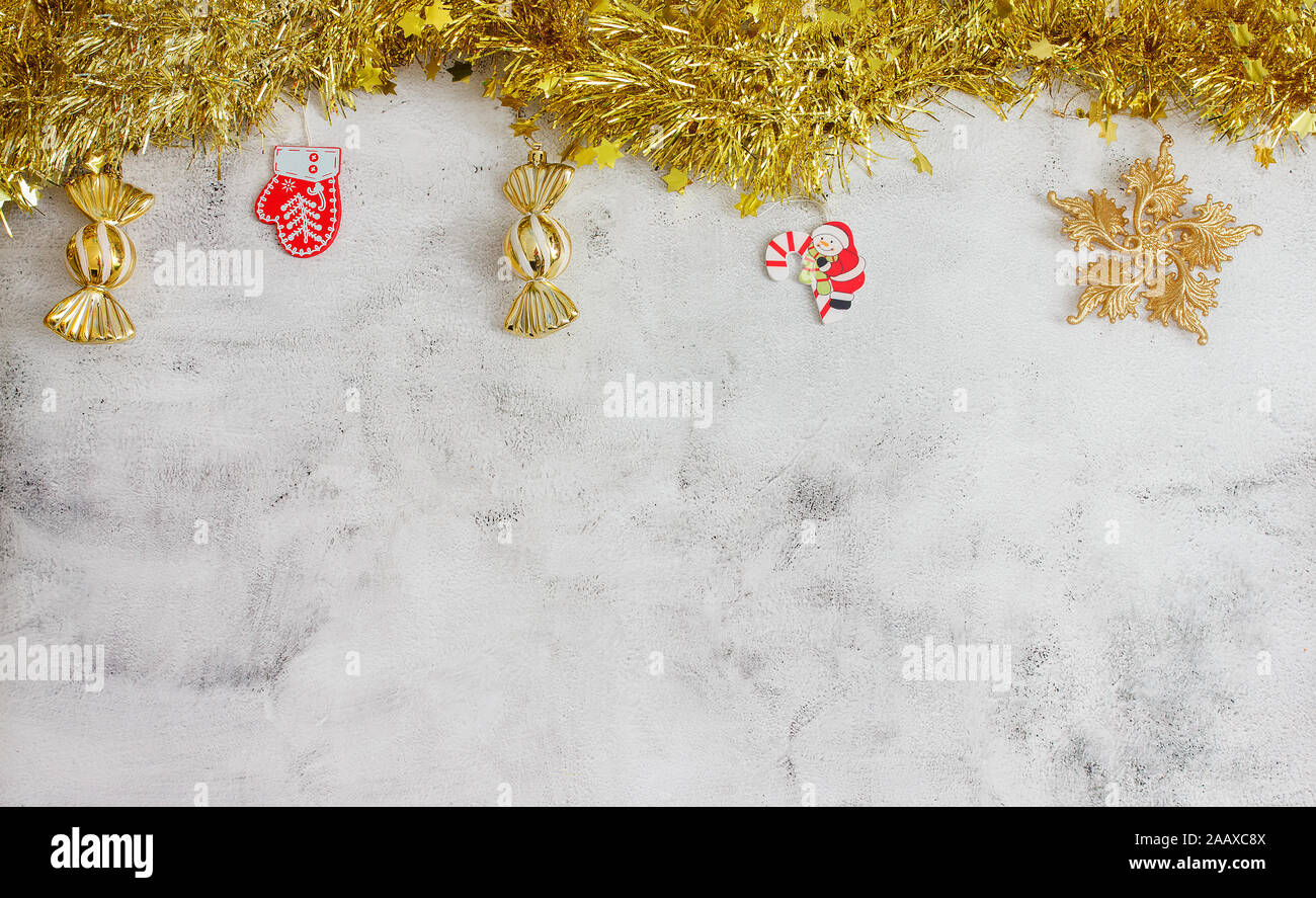 Christmas Grey Background With Golden Candy Mitten And Snow Stars Space Copy Stock Photo Alamy Christmas Grey Background With Golden Candy Mitten And Snow Stars Space Copy Stock Photo Alamy