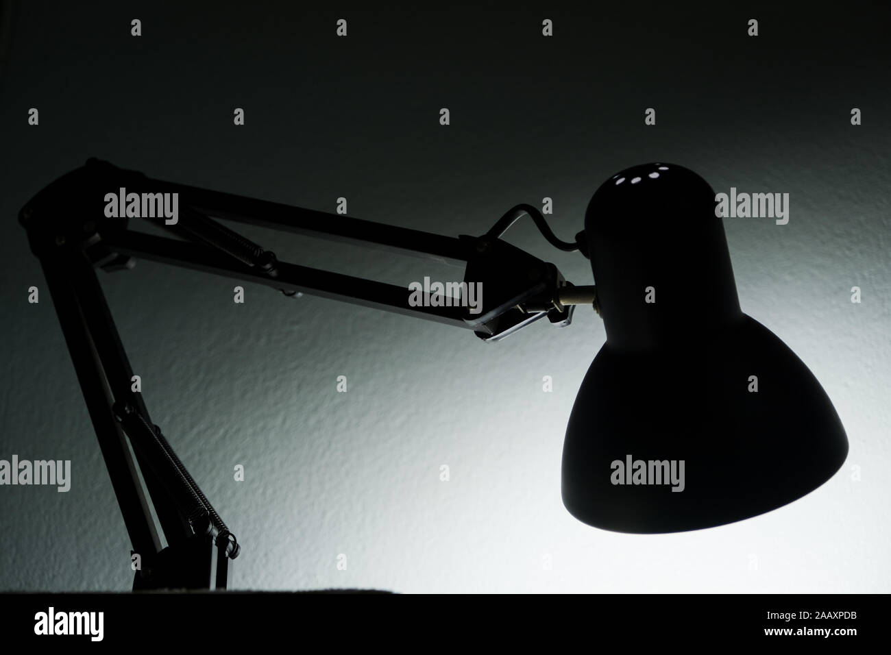 https://c8.alamy.com/comp/2AAXPDB/the-silhouette-of-a-table-lamp-on-the-background-of-a-window-in-the-morning-at-dawn-work-until-morning-work-at-night-2AAXPDB.jpg