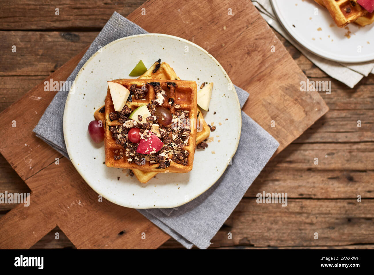 Homemade waffles with fruit and granola Stock Photo Alamy