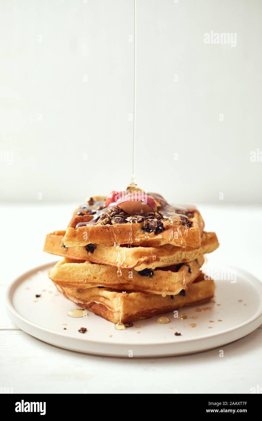 Homemade waffles with fruit and granola Stock Photo Alamy