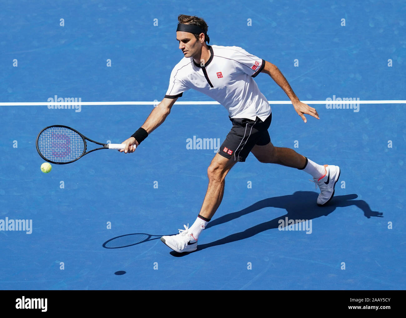 Swiss tennis player Roger Federer playing forehand volley during 2019 US Open tennis tournament, New York City, New York State, USA Stock Photo