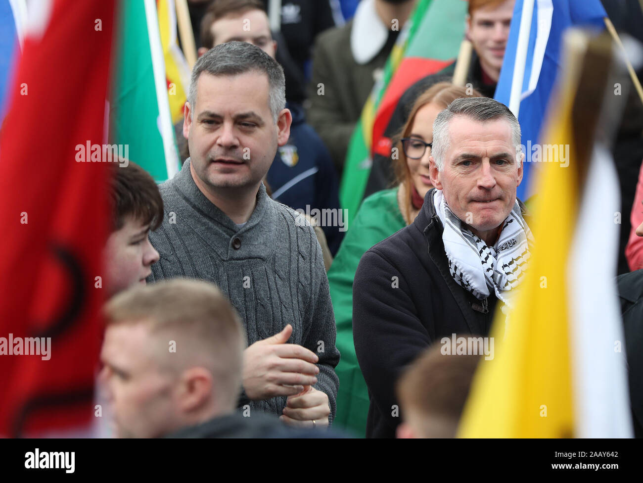 L-R Sinn Fein's Pearse Doherty and Declan Kearney take part in an Irish unity march as they cross the Lifford Bridge, from Donegal, which marks the border between Strabane in County Tyrone, Northern Ireland, and Lifford in County Donegal in the Republic of Ireland. Stock Photo