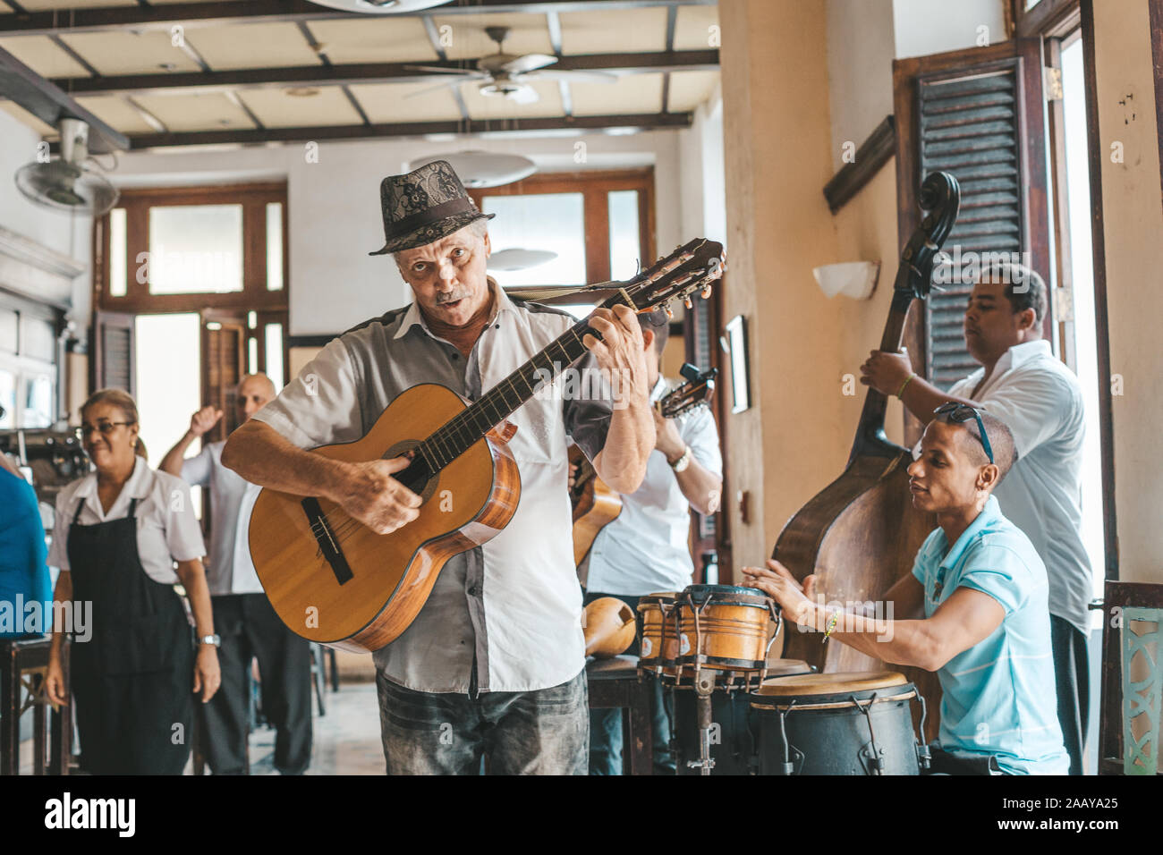 Havana, Cuba - October 18, 2019: Cuban band performing live music in a bar (Dos Hermanos) in Havana, Cuba. Stock Photo