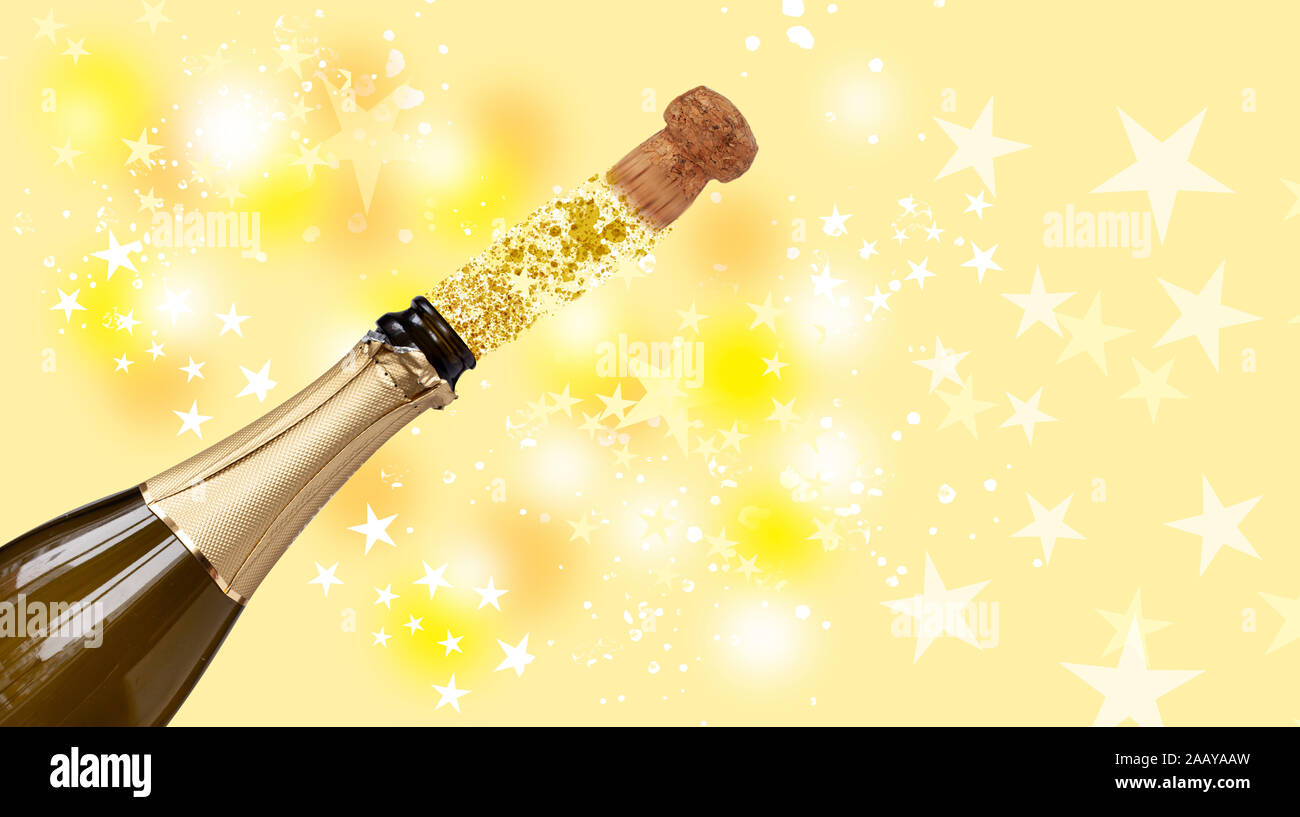Cork popping out from bottle with sparkling wine  at party on yellow bokeh background with stars and glitter. New Year evening concept. Stock Photo