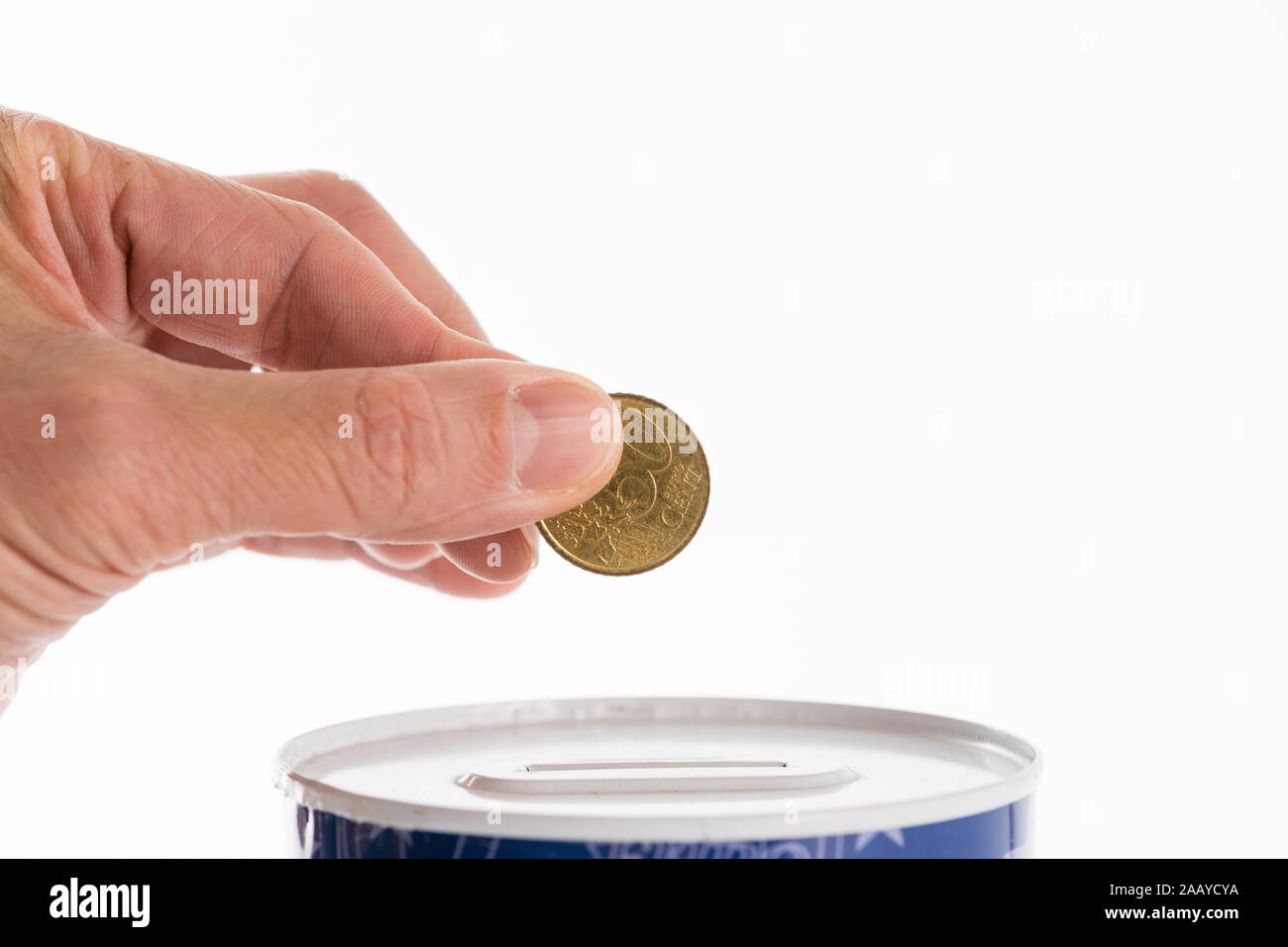 Male Hand Putting A Coin In 50 Cent Into Tin Can Saving Bank On White Background Close Up Stock Photo Alamy