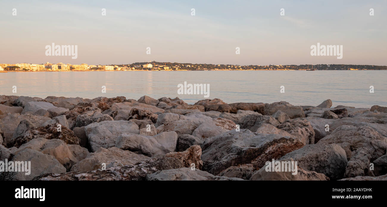 at sunset on the Mediterranean sea shore in winter Stock Photo