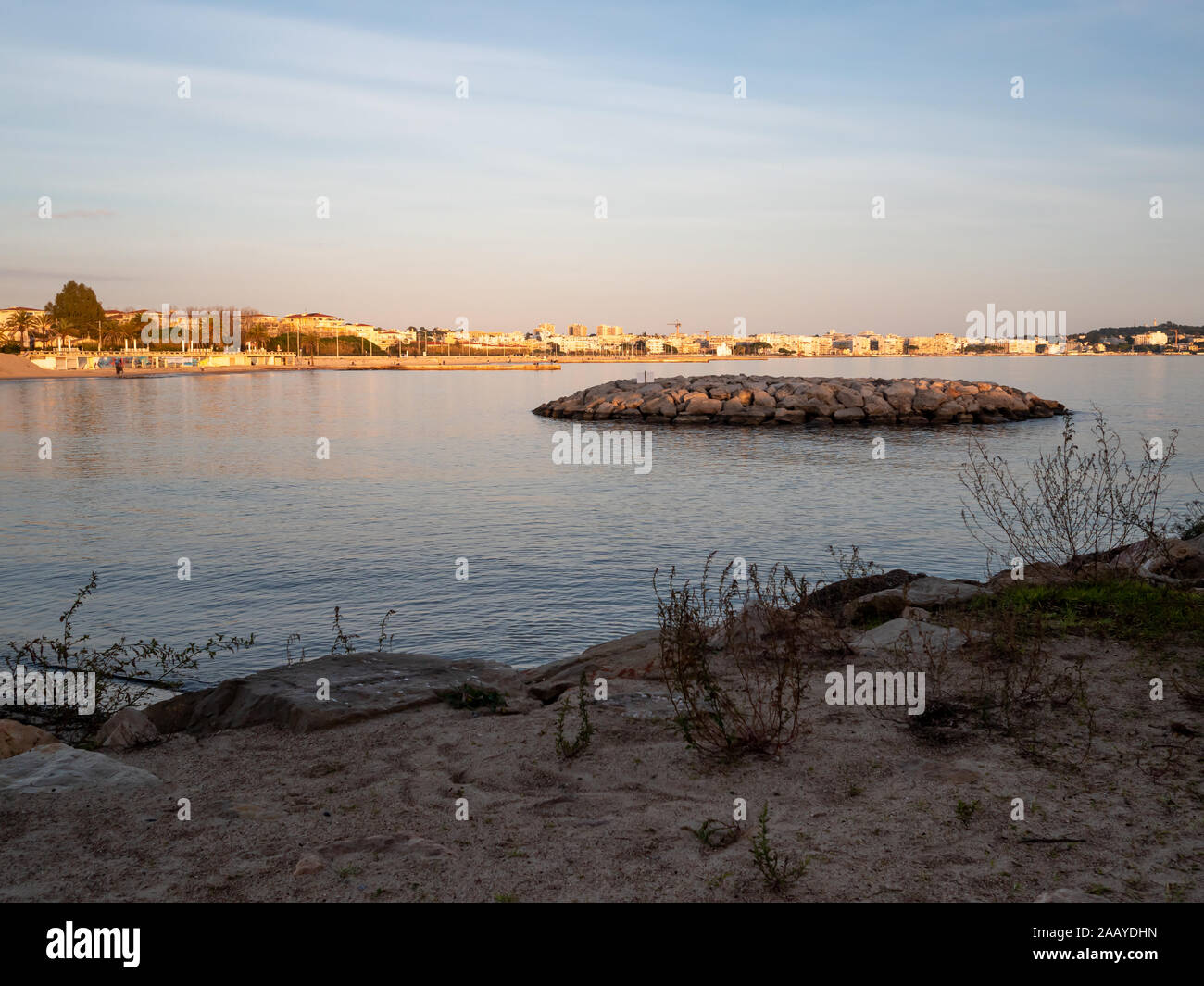 at sunset on the Mediterranean sea shore in winter Stock Photo