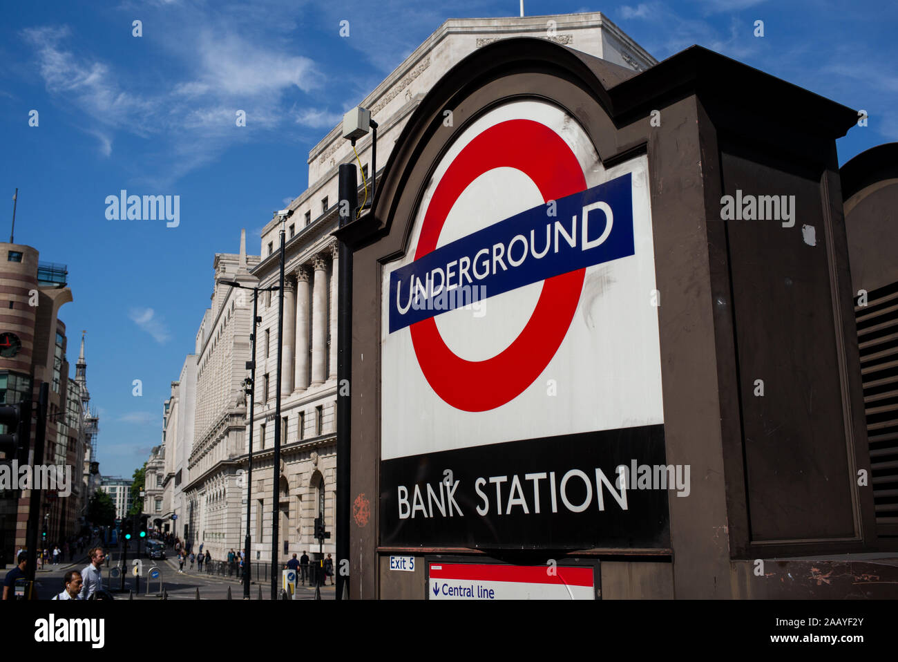 Bank Station Underground sign against buildings and blue sky Stock Photo