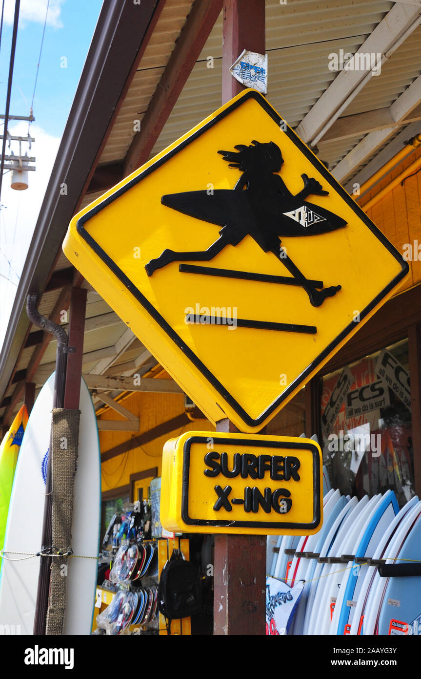 North Shore, Honolulu, Oahu/Hawaii, June 9, 2011: Surfer Crossing street sign in Haleiwa. Haleiwa is a popular destination for tourists for surfing an Stock Photo