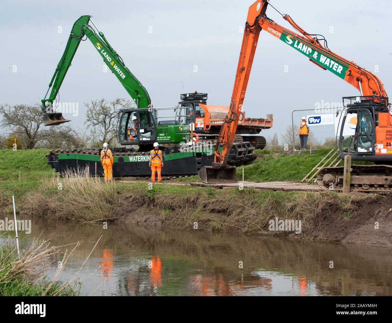Dredging begins on the local river to prevent further flooding at Moreland in Somerset. Homes in the area were recently devastated by severe flooding. March 2014. Stock Photo