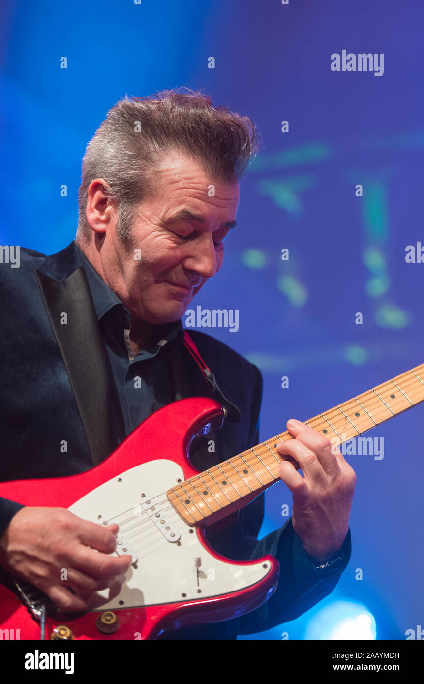 Eddie Lundon, guitarist and singer with the band China Crisis, performing on stage during a live concert Stock Photo