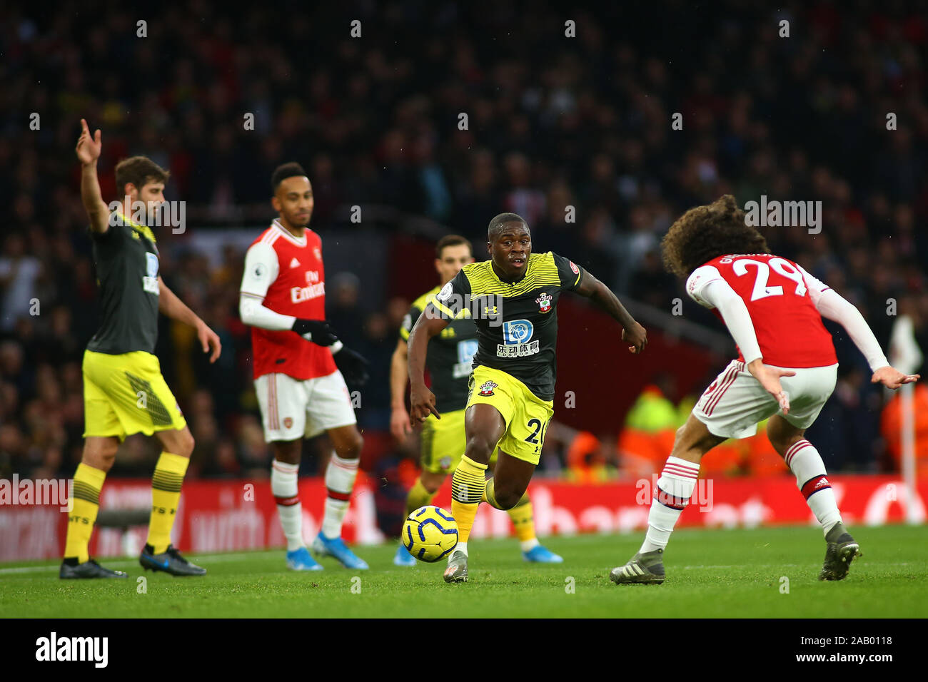 LONDON, United Kingdom, NOVEMBER 23.Southampton's forward Michael Obafemi runs at Arsenal's midfielder Matteo Guendouzi  during English Premier League Stock Photo
