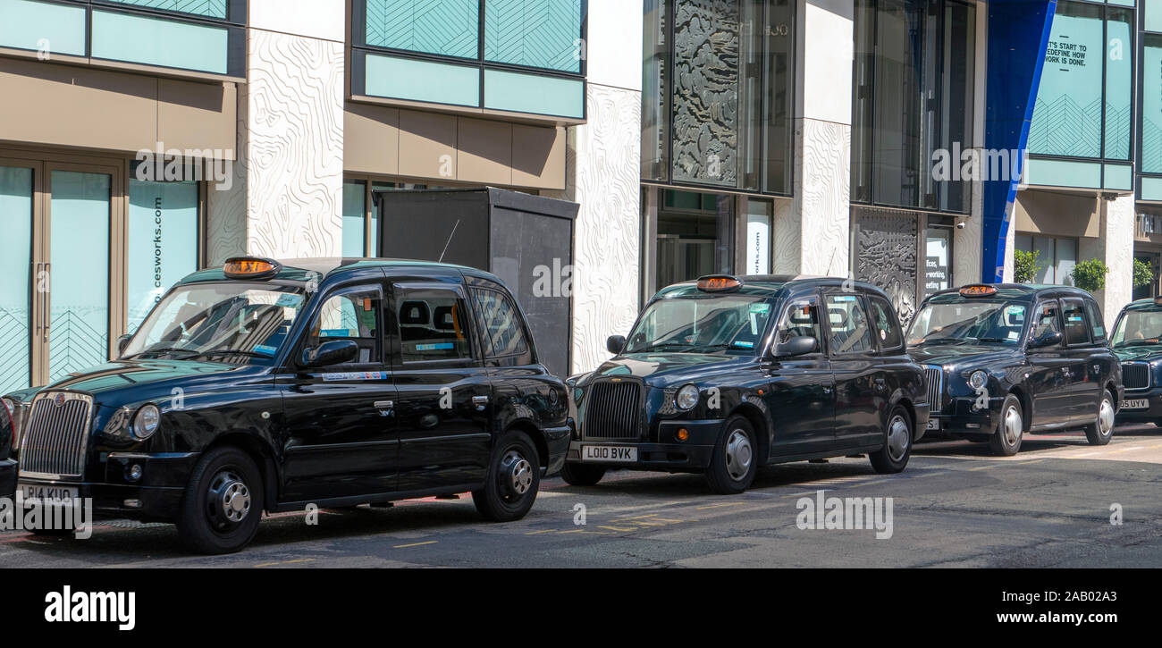 Taxi rank by Victoria Station London England Stock Photo
