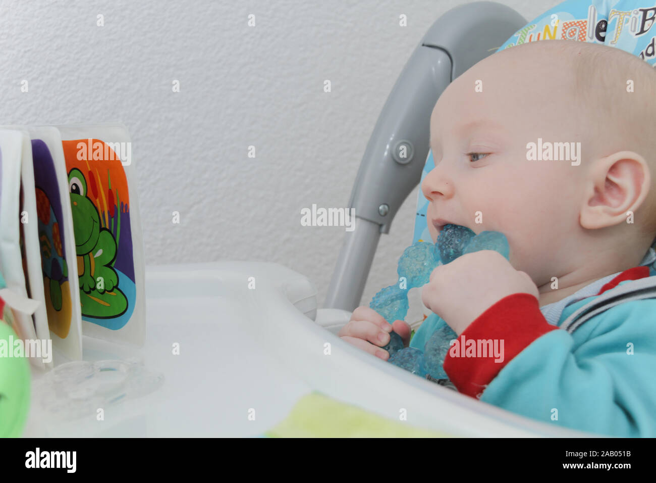 Photo of the Cute little baby boy is playing with toys Stock Photo - Alamy