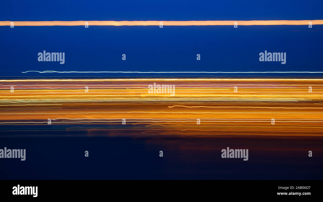 Abstract Light trails on dark background, motion blured Stock Photo - Alamy