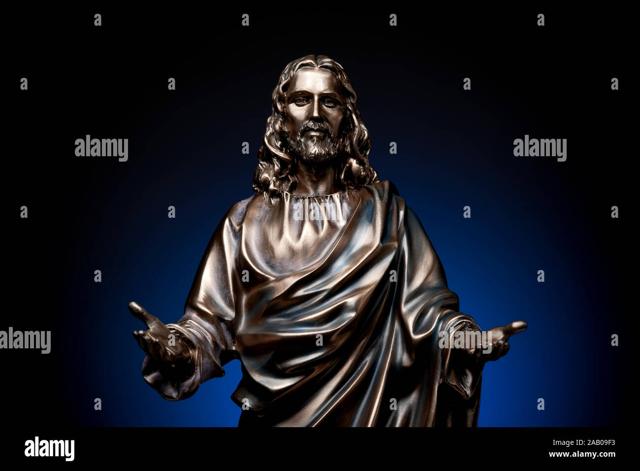 A small statue of a beckoning Jesus Christ Stock Photo Alamy