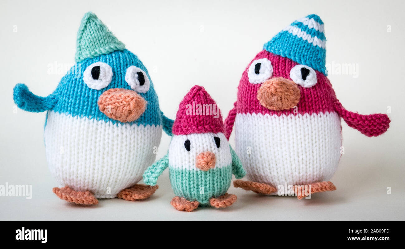 Knitted penguin family Christmas decoration Stock Photo
