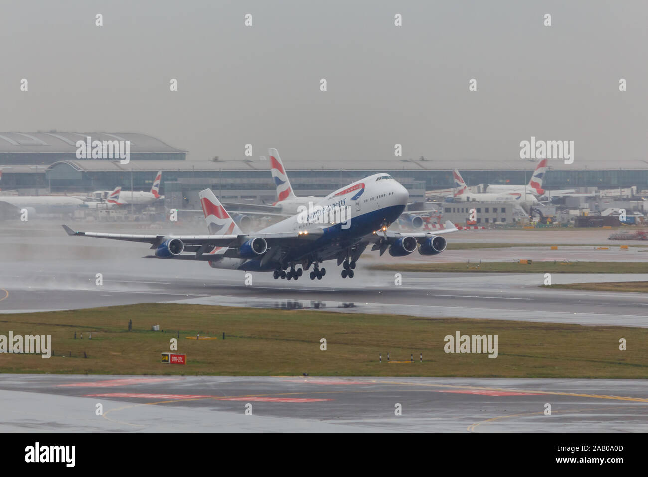 London, England - Circa 2019 : British Airways Boeing 747 Taking off from LHR Airport Stock Photo