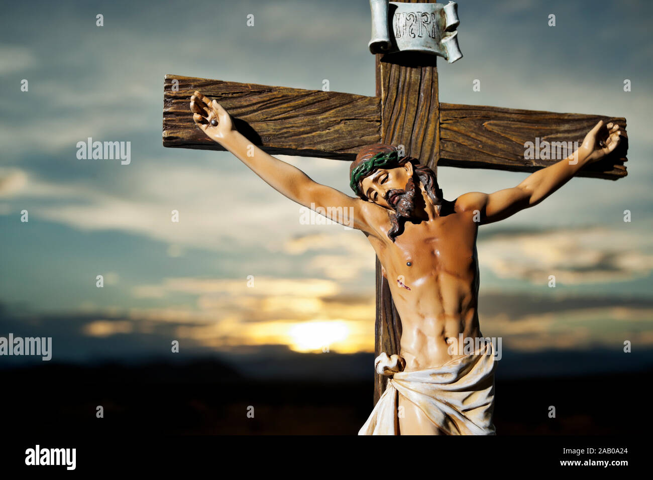 closeup of jesus crucified on the cross. Image shows the cross from below  Stock Photo - Alamy