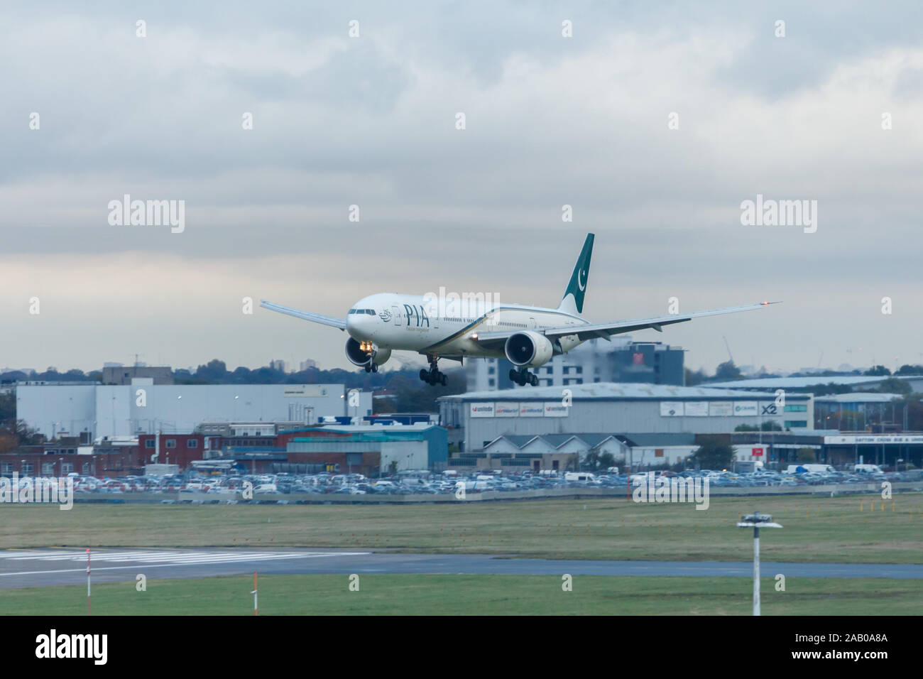 London, England - Circa 2019 : Pakistan International Airlines Boeing 777 Aircraft AP-BID Landing at London Heathrow Airport Stock Photo