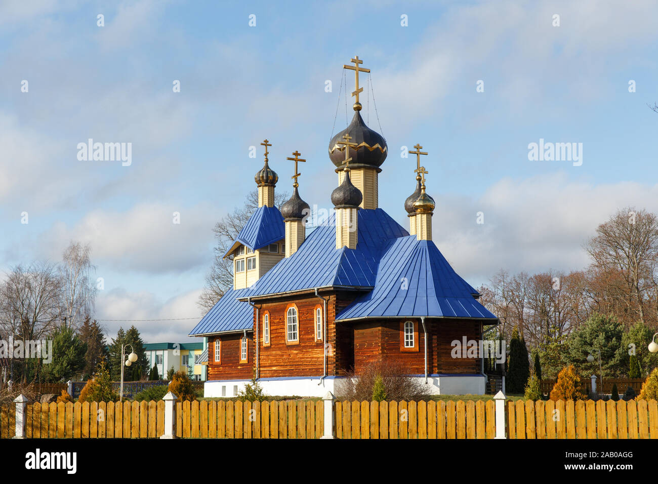 Wooden Orthodox church with golden domes and crosses Stock Photo - Alamy