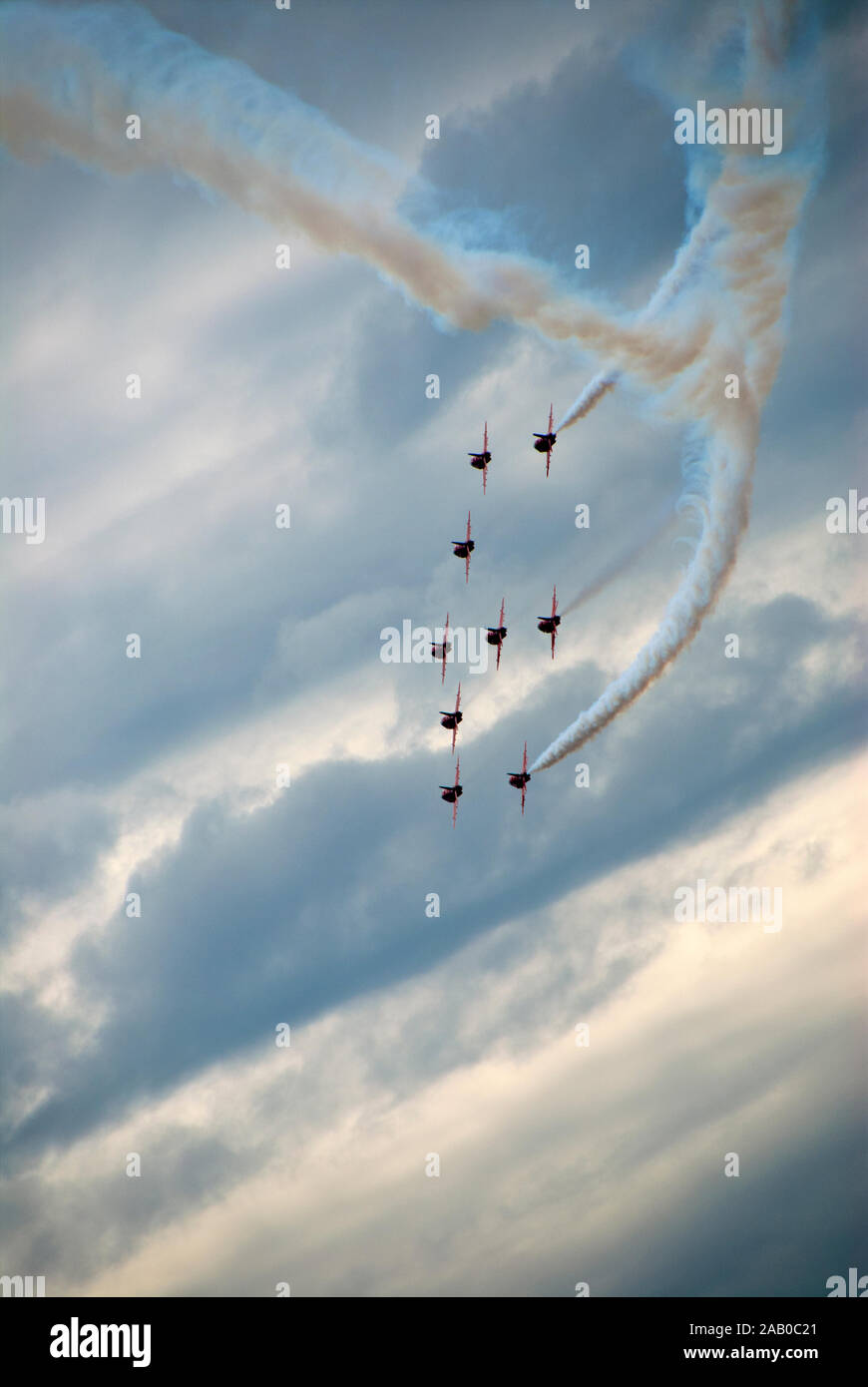 The Red Arrows head home after an airshow Stock Photo