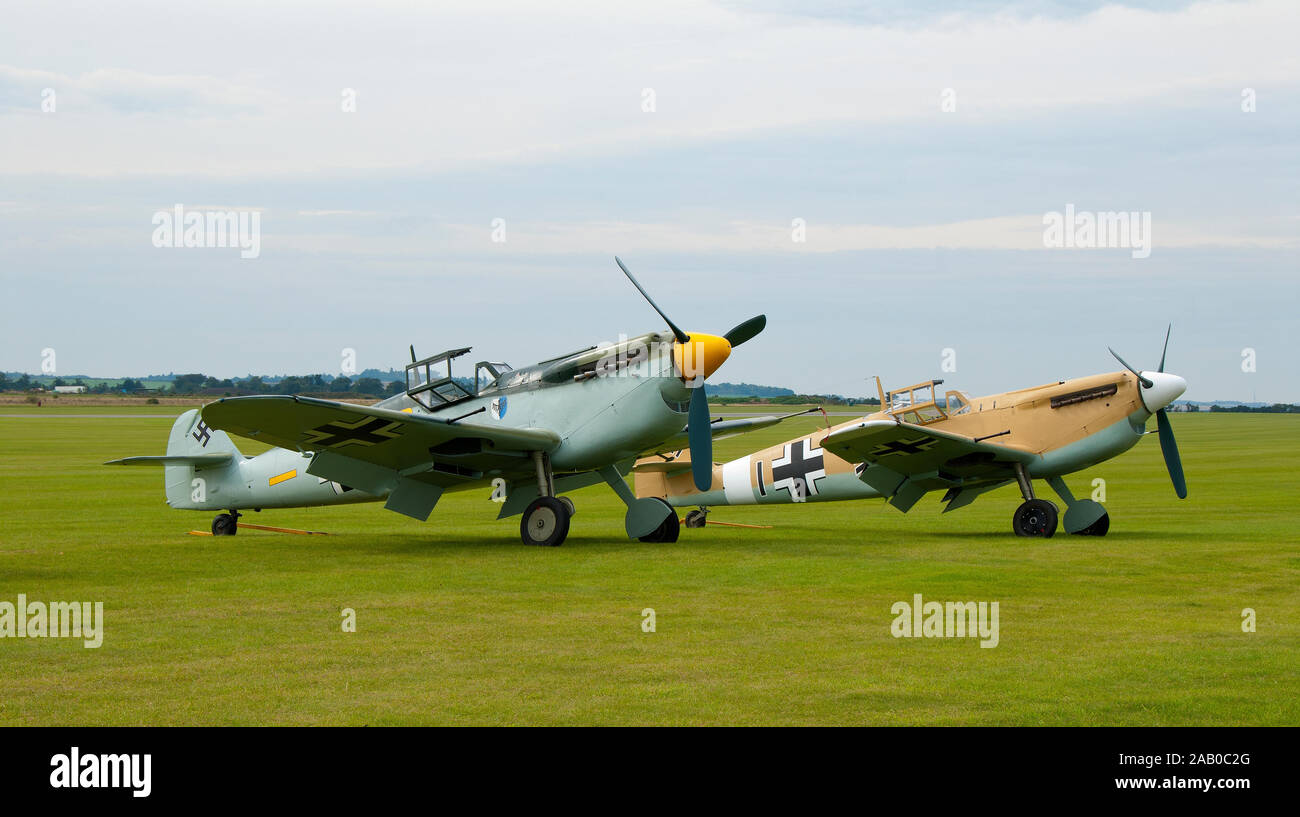A pair of Messerscmitt BF109's wait their turn to take to the skies at the Duxford Battle of Britain airshow. Stock Photo
