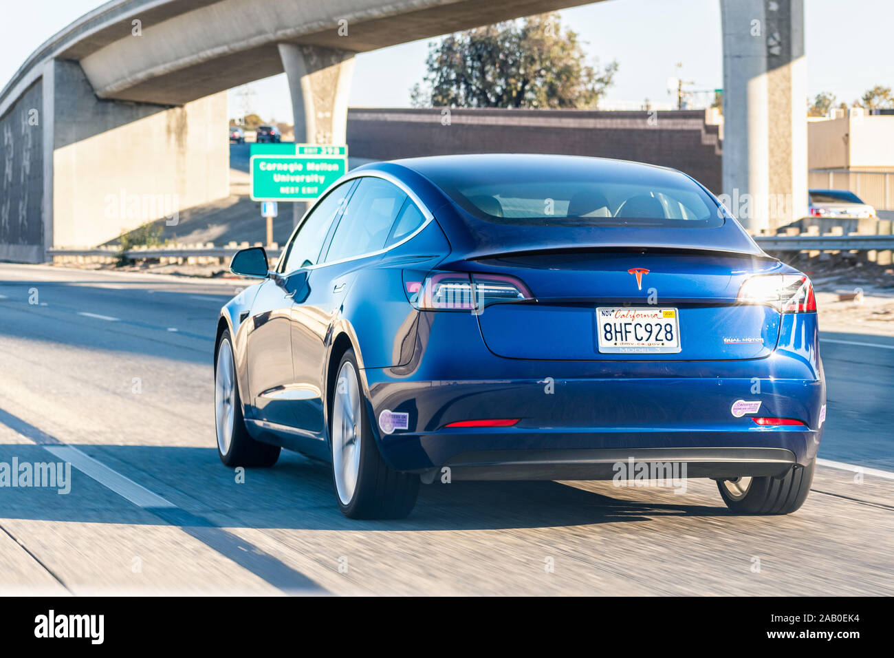 Nov 2, 2019 Mountain View / CA / USA -Tesla Model 3 driving on the freeway in San Francisco bay area Stock Photo