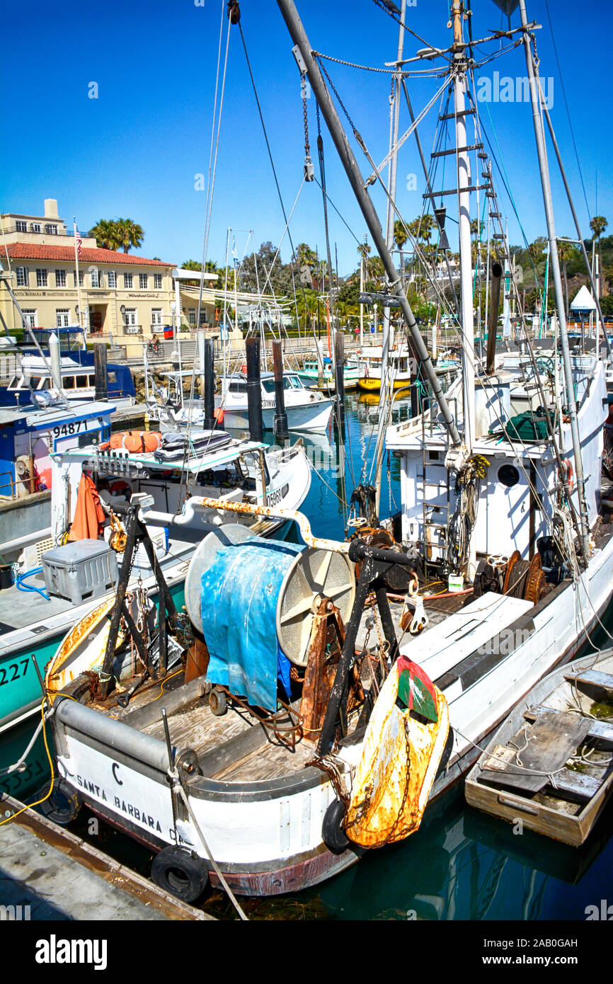 Well worn commercial fishing boat docked in the marina at the Santa Barbara Harbor in Santa Barbara, CA, Southern California Stock Photo