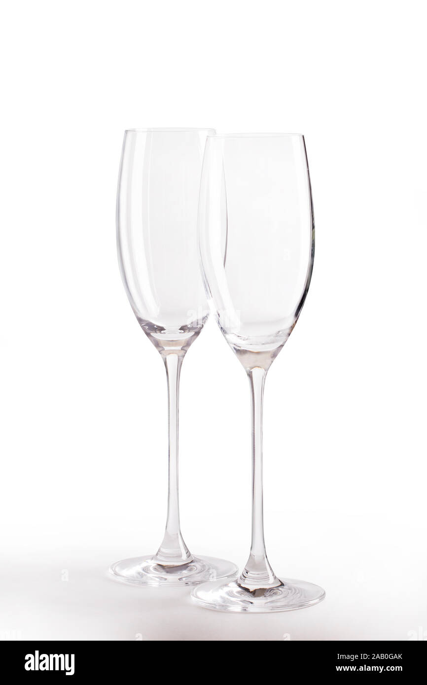 Empty wine glasses with clipping path on  uniform background. Stock Photo