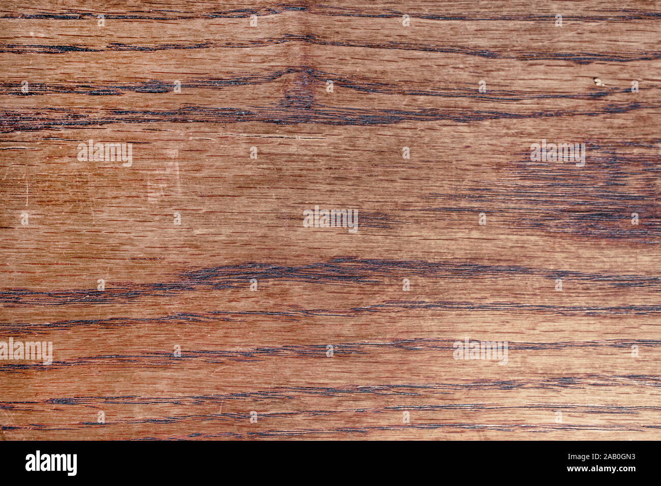 Photo of a medium dark wood texture. Stock Photo