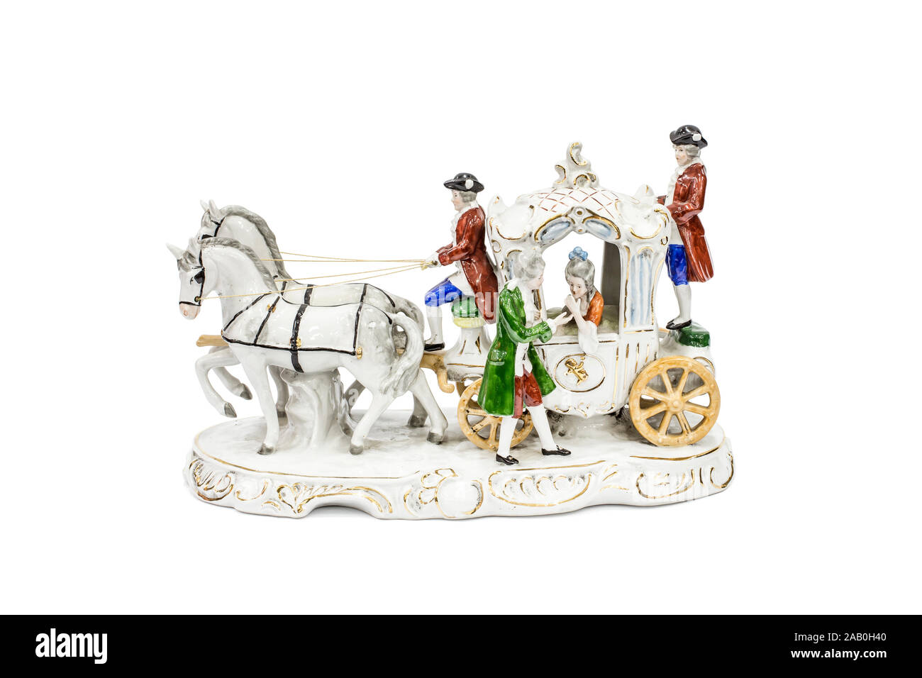 porcelain figurines of horse carriage on white background (with clipping path). Stock Photo