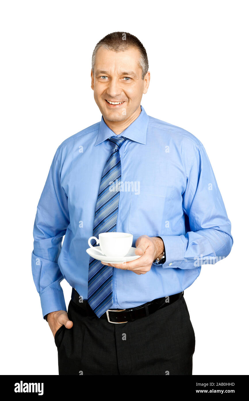 Ein Geschaeftsmann im blauen Hemd mit einer Tasse Kaffee Stock Photo