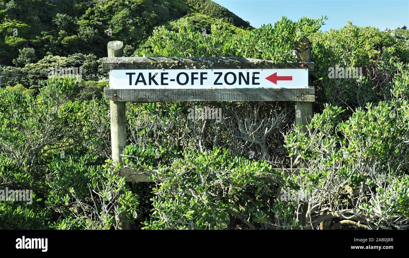 A sign on Petone Beach beside the Wellington Waterski Club, indicating the safe direction to land and take off Stock Photo